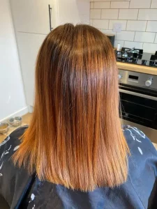 Mobile hairdresser in Derby performing a hair colour retouch service at home